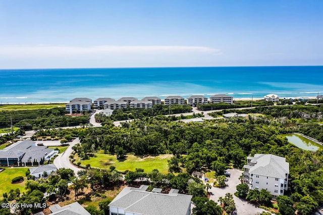 bird's eye view featuring a water view and a residential view