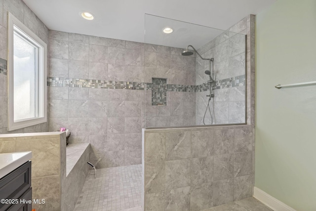 bathroom featuring baseboards, walk in shower, vanity, and recessed lighting