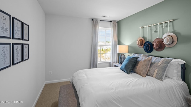 bedroom featuring carpet