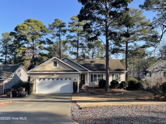 view of front of house with driveway and an attached garage