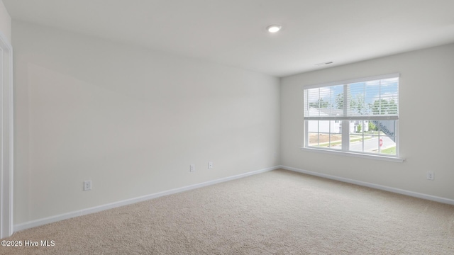 view of carpeted spare room