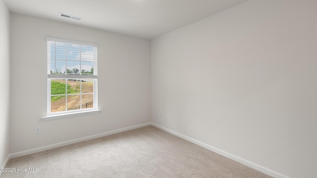 view of carpeted spare room