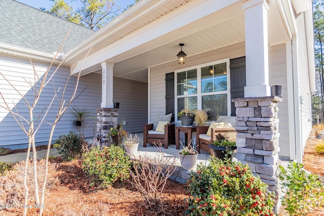 property entrance with covered porch