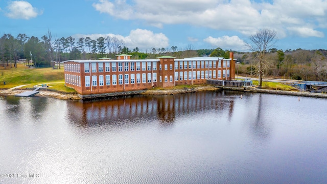 exterior space with a water view