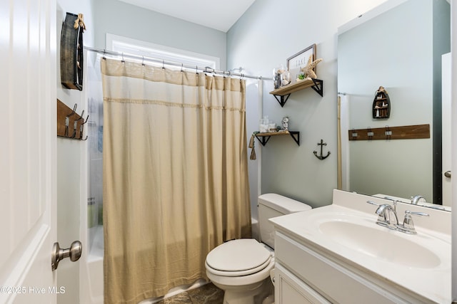 bathroom featuring vanity, shower / bath combination with curtain, and toilet