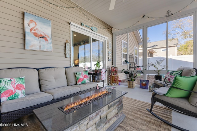 sunroom / solarium featuring plenty of natural light