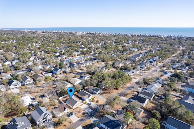 bird's eye view featuring a water view and a residential view