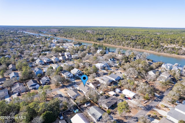 aerial view with a water view, a residential view, and a view of trees