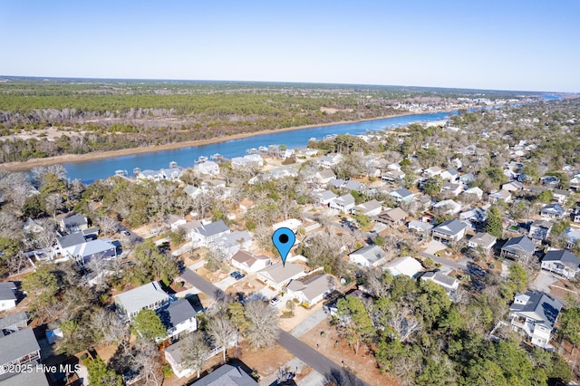 aerial view with a residential view and a water view