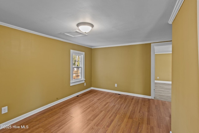 1206 N Bonner St, Washington, NC 27889 - unfurnished room with baseboards, ornamental molding, and wood finished floors