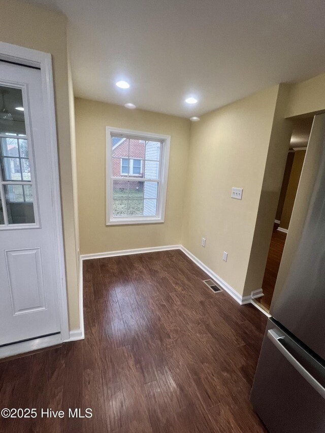 1206 N Bonner St, Washington, NC 27889 - spare room with baseboards, visible vents, wood finished floors, and recessed lighting
