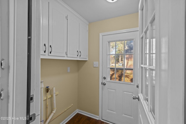 1206 N Bonner St, Washington, NC 27889 - clothes washing area featuring dark wood finished floors, baseboards, and laundry area