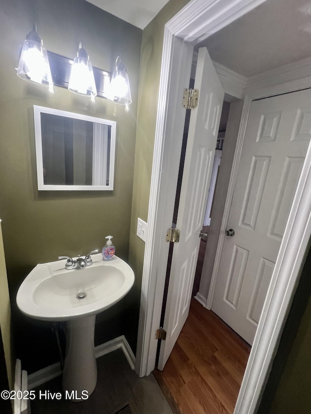 1206 N Bonner St, Washington, NC 27889 - bathroom with wood finished floors