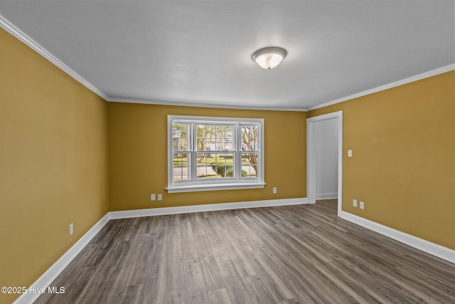 1206 N Bonner St, Washington, NC 27889 - spare room with dark wood finished floors, baseboards, and crown molding