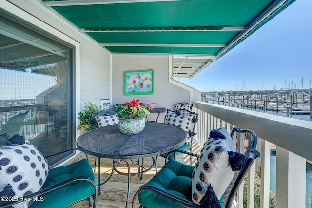 balcony featuring a sunroom