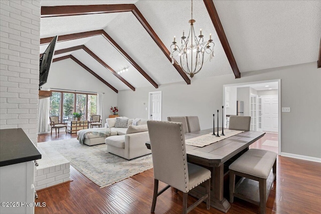 dining space featuring dark wood-style flooring, beamed ceiling, an inviting chandelier, a textured ceiling, and high vaulted ceiling