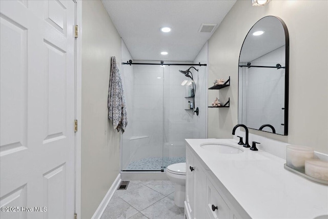 bathroom featuring a stall shower, visible vents, toilet, vanity, and recessed lighting