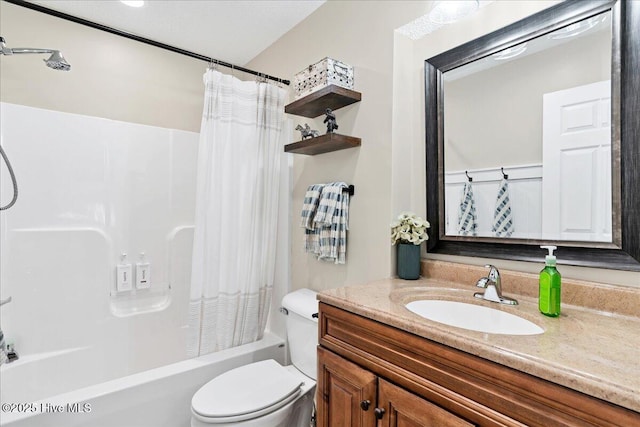 full bathroom featuring toilet, vanity, and shower / bathtub combination with curtain