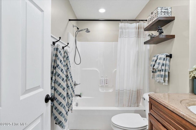 full bath featuring recessed lighting, shower / tub combo with curtain, vanity, and toilet