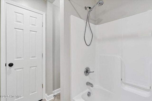 bathroom featuring shower / bath combination