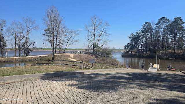199 Tylers Cove Way, Winnabow, NC 28479 - dock area featuring a water view