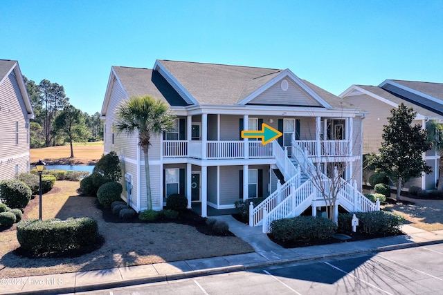 view of front facade with covered porch and stairs