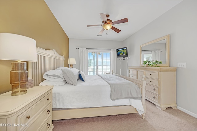 bedroom featuring light carpet, visible vents, a ceiling fan, and baseboards