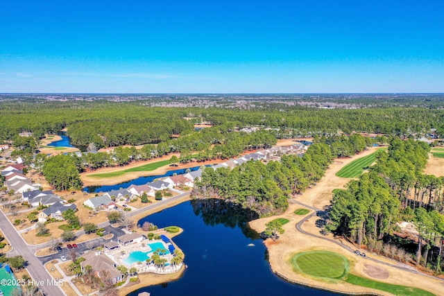 aerial view featuring a water view and a wooded view