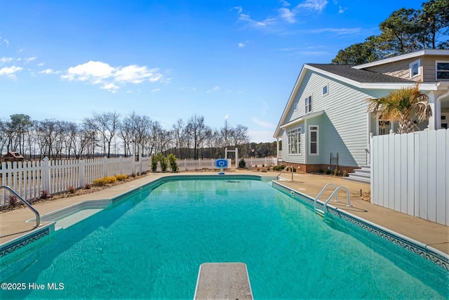 view of pool with a patio area, fence, and a fenced in pool