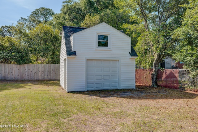 detached garage with fence
