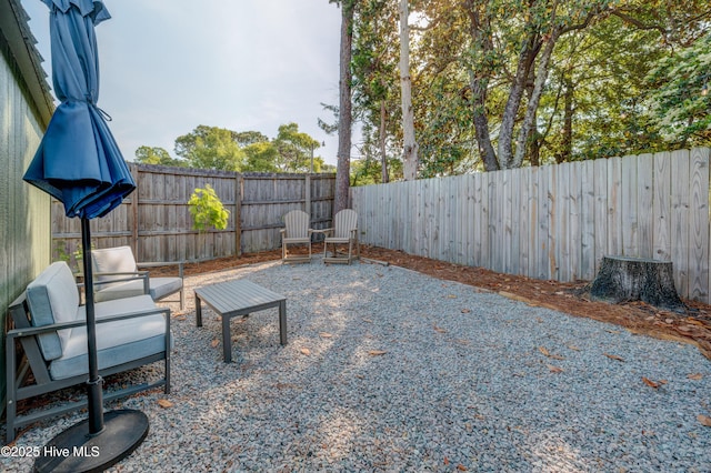 view of patio featuring a fenced backyard