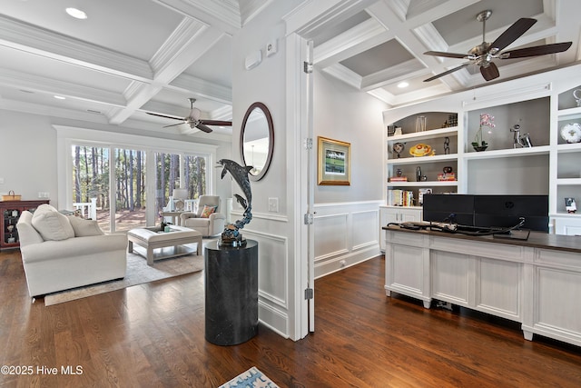 interior space with beamed ceiling, coffered ceiling, dark wood finished floors, and built in features