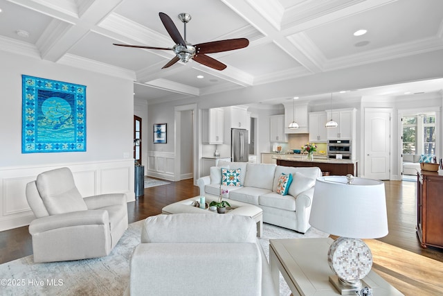 living area featuring dark wood-style floors, ornamental molding, coffered ceiling, and beam ceiling