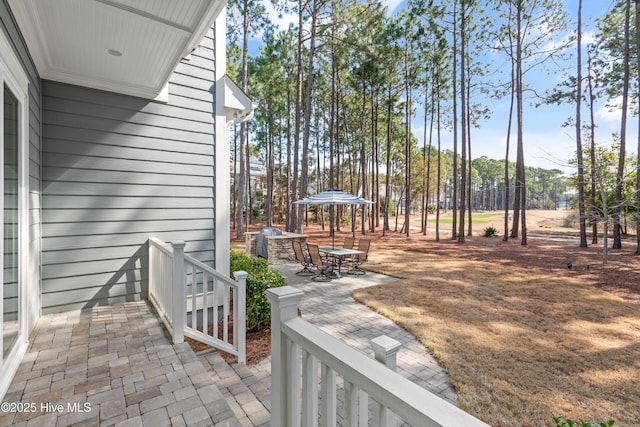 view of patio featuring outdoor dining area