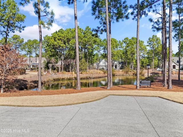 view of property's community featuring a water view