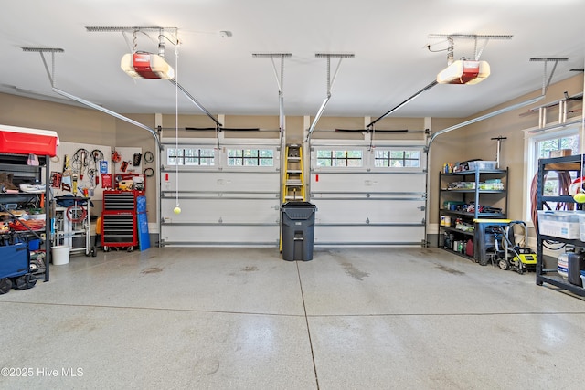 garage featuring a garage door opener