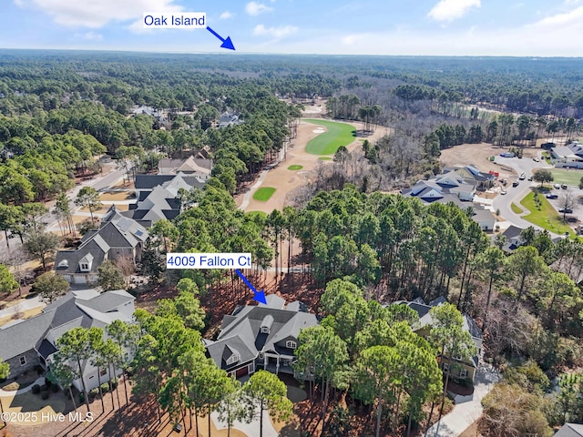 aerial view featuring a residential view and a view of trees