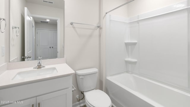 full bath with visible vents,  shower combination, vanity, and toilet