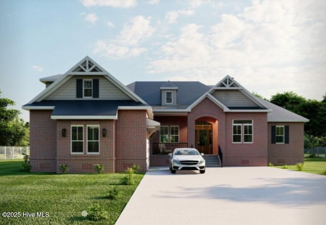 view of front of house featuring crawl space, brick siding, and a front yard