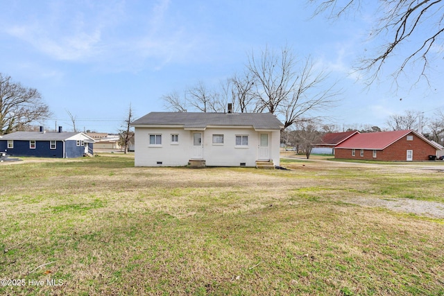 bungalow-style home with crawl space and a front lawn