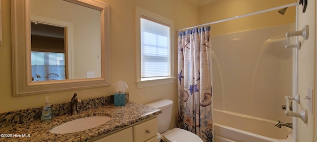 full bathroom featuring toilet, shower / bath combo, and vanity