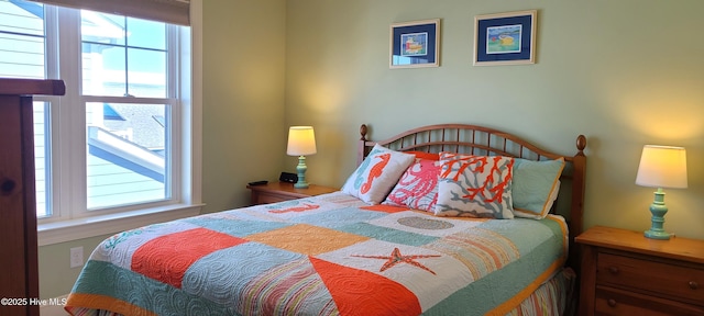 bedroom with multiple windows