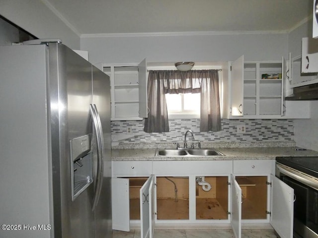 kitchen with light countertops, appliances with stainless steel finishes, a sink, and white cabinetry