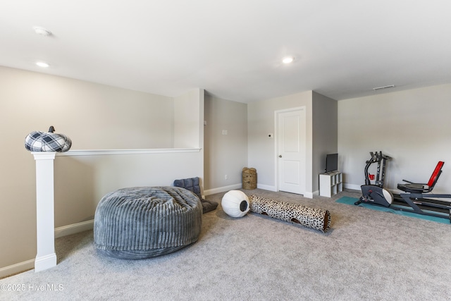 exercise room with carpet floors, recessed lighting, and baseboards