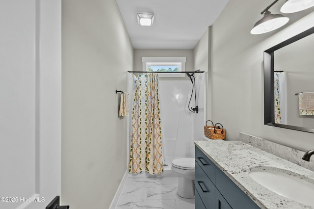 full bath featuring curtained shower, marble finish floor, vanity, and baseboards