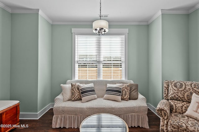 living area with ornamental molding, visible vents, dark wood finished floors, and baseboards