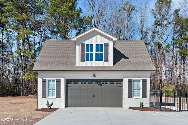 exterior space featuring driveway and fence