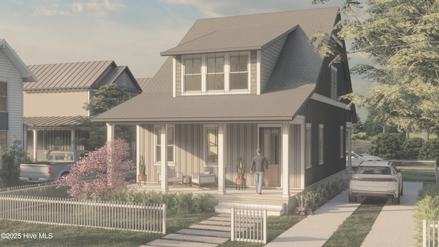bungalow with board and batten siding, a porch, and fence