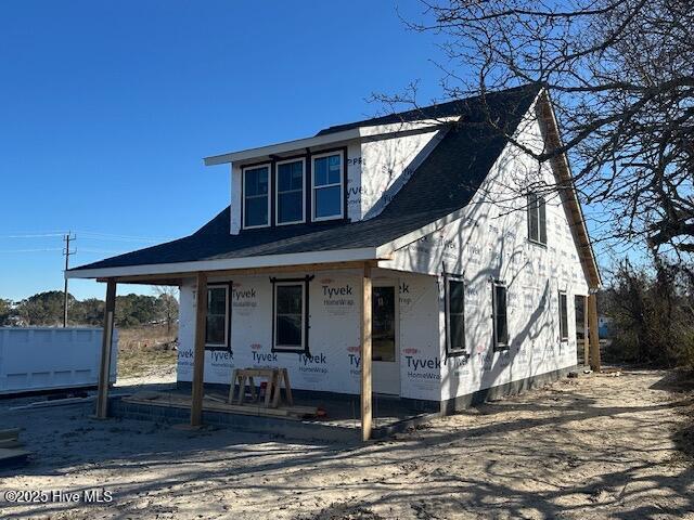 property in mid-construction with a porch