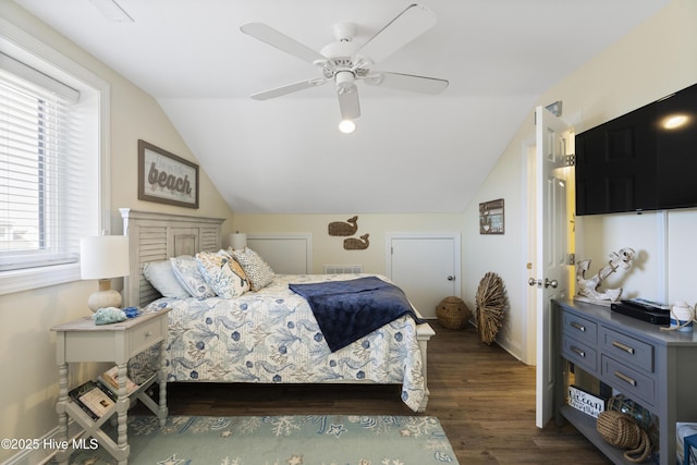 886 New River Inlet Rd Unit 41, North Topsail Beach, NC 28460 - bedroom with lofted ceiling, dark wood-style flooring, ceiling fan, and baseboards